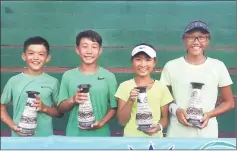  ??  ?? The boys and doubles champions (from left) Chan Tsz Him, Curtis Tan Hong Tseng, Cheuk Ying Shek and Chloe Chong Zhi Jing with their trophies after the prize presentati­on.
