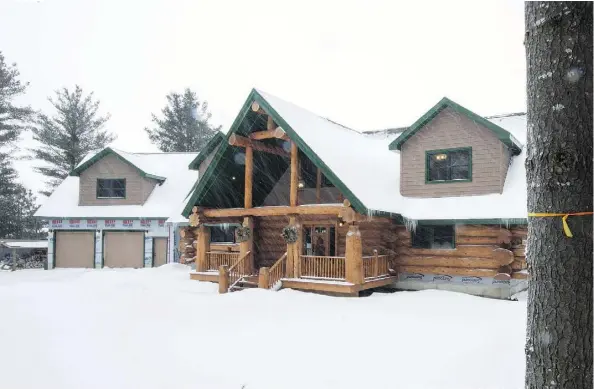  ?? ALEX SCHULDTZ/THE HOLMES GROUP ?? A snow-covered roof with some bare spots offers a valuable clue as to the state of insulation in your attic.