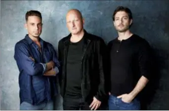  ?? PHOTO BY TAYLOR JEWELL — INVISION — AP, FILE ?? In this file photo, Wade Robson, from left, director Dan Reed and James Safechuck pose for a portrait to promote the film “Leaving Neverland” at the Salesforce Music Lodge during the Sundance Film Festival in Park City, Utah.