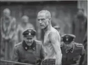  ?? LEO PINTER — HBO ?? Ben Foster as concentrat­ion camp prisoner Harry Haft in a scene from “The Survivor.”
