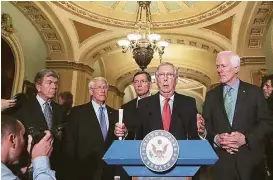  ?? Chip Somodevill­a / Getty Images ?? Senate Majority Leader Mitch McConnell, second from right, faces a challenge on packaging a Zika virus emergency funding bill that will pass the House. He is flanked by Sens. Roy Blunt, Roger Wicker, John Barrasso and John Cornyn.