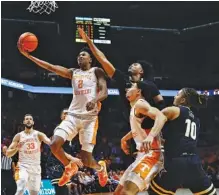  ?? AP PHOTO/WADE PAYNE ?? Tennessee forward Julian Phillips (2) shoots during the first half of Tuesday’s win over Vanderbilt in Knoxville.