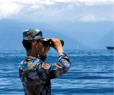  ?? ?? CONSTANT THREAT Chinese People’s Liberation Army naval exercises around the Taiwan Island this August.
