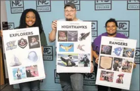  ?? The Sentinel-Record/Richard Rasmussen ?? FINAL THREE: National Park College students, from left, Keanna Peck, Matt Matheson and Morgan Ables-Hill displayed the concept boards for the college’s final three mascot choices Thursday in the Gerald Fisher Campus Center. Students, faculty and staff...