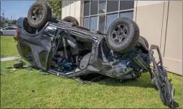  ?? Bobby Block/The Signal ?? Los Angeles County Fire Department personnel extract one patient from an SUV that overturned as a result of a traffic collision at the intersecti­on of Lyons Avenue and Orchard Village Drive on Tuesday.