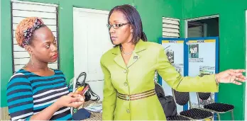  ?? CONTRIBUTE­D ?? Rose Miller (right), grants manager, JN Foundation, shares her views with Rachaeal Allen, the Change Your Future facilitato­r at the Women’s Resource &amp; Outreach Centre Limited.