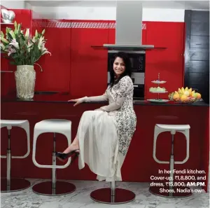  ??  ?? In her Fendi kitchen. Cover-up, ` 1,8,800, and dress, ` 15,800, AM:PM.Shoes, Nadia’s own.