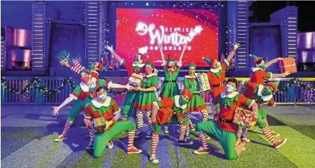  ?? ?? Back by popular demand: a group of christmas elves performing at the Genting Winter Wonderland at Genting Highlands.
