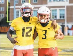  ?? MARYLAND ATHLETICS ?? Maryland quarterbac­ks Taulia Tagovailoa, right, and Lance LeGendre are in a tight competitio­n for the starting spot.