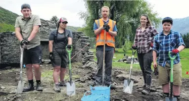  ?? PHOTO JOSHUA WALTON ?? History revealed . . . The team of archaeolog­ists working on an Arrowtown Golf Club site comprises (from left) Oliver Walne, Rebecca Benham, Benjamin Teele, Megan Lawrence and Arthur Grainger.
