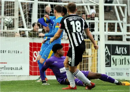  ?? PICTURES: Simon Howe ?? Jordan Dyer scores his second goal is as many games for Bath City during victory over Concord Rangers