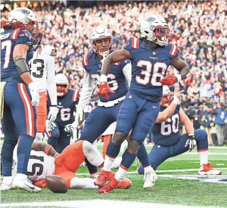  ?? BRIAN FLUHARTY / USA TODAY SPORTS ?? New England Patriots running back Rhamondre Stevenson (38) reacts after scoring a touchdown against the Cleveland Browns. Stevenson will likely be a popular addition to fantasy football rosters this week.
