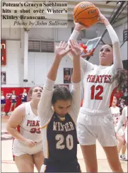  ?? Photo by John Sullivan ?? Poteau’s Gracyn Soehlman hits a shot over Wister’s Kinley Branscum.