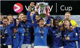  ?? Park. Photograph: Steve Welsh/PA ?? The Rangers captain and match-winner, James Tavernier, lifts the League Cup at Hampden