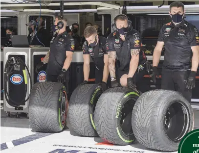  ?? Picture: AFP ?? WHEELING. F1 pit crews are set to do a lot more tyre changes during qualifying sessions.