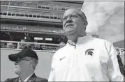  ?? [ASSOCIATED PRESS FILE PHOTO] ?? Michigan State University athletics director Mark Hollis, right, and president Lou Anna Simon watch the action during a football game against Wisconsin, Sept. 24, 2016 in East Lansing, Mich.