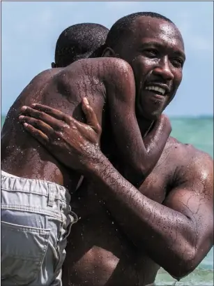  ??  ?? Mahershala Ali and Alex Hibbert in Moonlight.