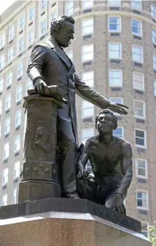  ?? Stuart CahILL / hEraLd StaFF ?? ‘RACIST DEPICTION’: The Emancipati­on statue in Park Square is slated to be taken down after a petition garnered 12,000 signatures for its removal.