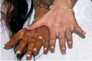  ??  ?? Peoples and Edwards show their wedding rings after making history in Northern Ireland. Photograph: Liam McBurney/PA