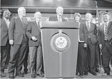  ?? Tom Brenner / New York Times ?? Sen. Orrin Hatch, R-Utah, joined other ebullient Republican­s at a news conference after they passed a sweeping tax bill, with Majority Leader Mitch McConnell, R-Ky., calling it “a great day for the country.”