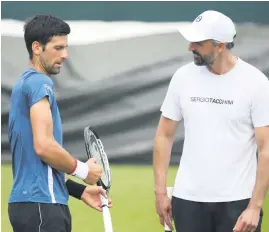  ?? Picture: AFP ?? END OF A CHAPTER. Novak Djokovic (left) and coach Goran Ivanovic have decided to go their seperate ways.