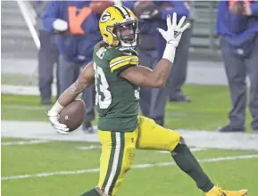  ?? DAN POWERS/ USA TODAY NETWORK-WISCONSIN ?? Packers running back Aaron Jones is 32 yards shy of reaching 1,000 rushing yards for the second straight season.