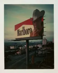  ??  ?? Dead Man Smoking, LA, 1977 © Wim Wenders. CourtesyWi­m Wenders Stiftung