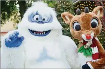  ?? CONTRIBUTE­D BY STONE MOUNTAIN PARK ?? Bumble the Abominable Snow Monster and Rudolph the RedNosed Reindeer are part of the Stone Mountain Christmas parade.