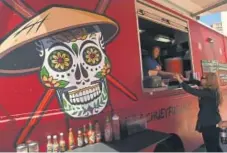  ?? Helen H. Richardson, Denver Post file ?? Chuey Fu’s Latin Asian Grub Food truck at Civic Center EATS on May 3, 2016.