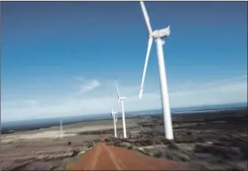  ??  ?? Blown away: Wind farms, such as this one near Darling on the West Coast, are gaining traction, with the cost of wind energy dropping by 68%. Photo: David Harrison