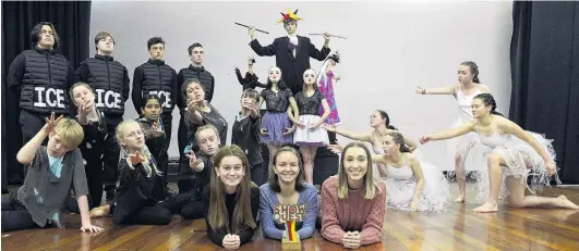  ?? PHOTO: GERARD O’BRIEN ?? Quest to be best . . . Logan Park High School pupil directors (centre, from left) Josie Baughen (16), Linea Simons (17) and Olivia Bradfield (17) celebrate with the cast after winning the inaugural Otago and Southland Showquest in Invercargi­ll.