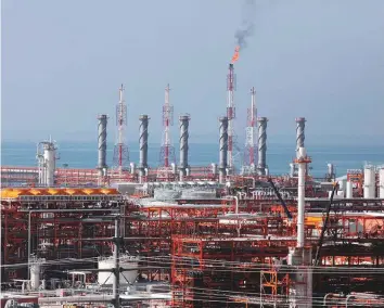  ?? AP ?? The gas refinery at the South Pars gas field in Asalouyeh, Iran. Paris-based IEA maintained its forecast of strong growth in demand for oil this year of 1.4 million bpd and another 1.5 million bpd in 2019 — unchanged from its previous projection.