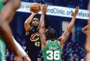  ?? Ron Schwane/Associated Press ?? Cavaliers guard Donovan Mitchell scored 40 points to rally Cleveland past the Celtics in overtime.