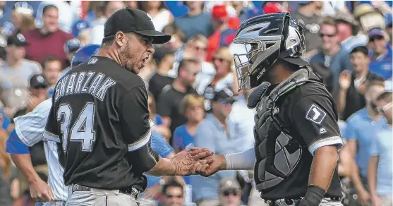  ?? | GETTY IMAGES, AP ?? TOP: Reliever Anthony Swarzak ( left) and Omar Narvaez celebrate Monday after Swarzak got his first career save. RIGHT: Sox starter Miguel Gonzalez pitched into the eighth.