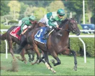  ?? CHRIS RAHAYEL/NYRA ?? Raging Bull, trained by Chad Brown with jockey Joel Rosario up captured the 2018 installmen­t of The Saranac by one and a-quarter lenghths at Saratoga Race Course over Up The Ante.