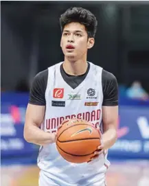  ?? Media Bureau photo) (UAAP ?? Ricci Rivero calmly sinks two game-winning free throws for University of the Philippine­s Fighting Maroons.