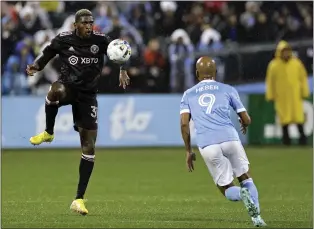  ?? ADAM HUNGER — THE ASSOCIATED PRESS ?? Inter Miami defender Damion Lowe, left, controls the ball in front of New York City FC forward Héber, right, last season. Lowe was traded to the Union in January.