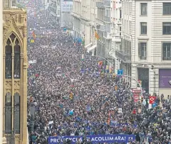  ?? AP ?? Thousands in Barcelona, Spain, march to demand Spain’s government to increase its efforts to take in refugees who have fled war in Syria and other violent conflicts.