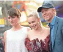  ?? CHARLEY GALLAY/GETTY IMAGES FOR DISNEY ?? Phoebe Waller-Bridge, left, with “Solo” co-star Emilia Clarke and director Ron Howard, says because of the way her role was shot, “I was more fearless.”