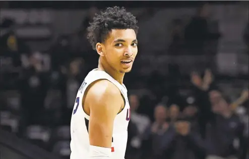  ?? Jessica Hill / Associated Press ?? UConn’s James Bouknight is currently living on campus in Storrs, where the coronaviru­s is less prevalent than it is in his hometown of Brooklyn.