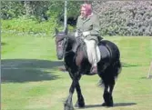  ?? AP ?? Queen Elizabeth rides Balmoral Fern, a Fell Pony, at Windsor Home Park over the weekend in May, in Windsor, England.