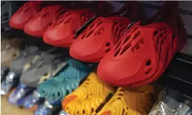  ?? Jordans. Photograph: Seth Wenig/AP ?? Yeezy shoes at a resale store last year. The shoes helped Adidas compete with Nike’s Air