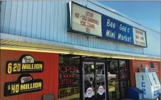  ?? WAYNE BAKER/STAFF ?? Bee-Gee’s Mini Market in Kettering sold a $1 million ticket in the Mega Millions drawing. In the last fiscal year, Bee-Gee’s sold tickets that won $21,350 in Mega Millions prizes and $220,010 overall.