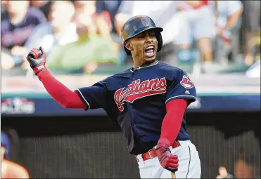  ?? JASON MILLER/GETTY IMAGES ?? Cleveland Indians superstar shortstop Francisco Lindor hit 38 home runs and led the AL in runs last season, but a calf injury could keep the all-star off the field until early April.