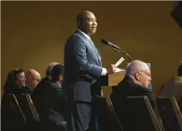  ?? MATT ROURKE/AP ?? Democratic National Committee chair Jaime Harrison speaks Saturday at the DNC’s Winter Meeting in Philadelph­ia, where a new primary lineup for 2024 was approved.