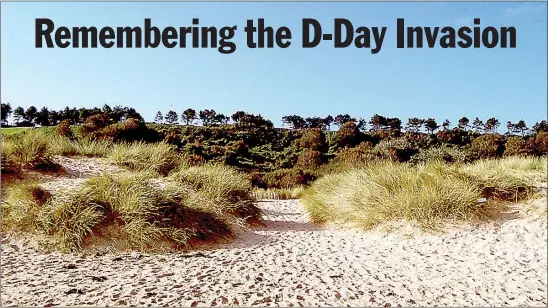  ?? Photo submitted ?? Mark Kreymborg took this photo on a beach in Normandy to recreate one of the few surviving photos of the Invasion on D-Day.