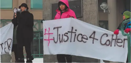  ?? CITIZEN PHOTO BY STUART NEATBY ?? Kim Gouchie, right, a respected member of the local First Nations community in Northern B.C., says a few words about feeling the loss of a young Aboriginal man from a mother’s perspectiv­e during the Justice for Colten Boushie rally on the steps of the Prince George Courthouse held Monday afternoon.