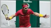  ?? AP/BERNAT ARMANGUE ?? Rafael Nadal of Spain reacts during his Davis Cup semifinal doubles match victory with Feliciano Lopez against Great Britain’s Neal Skupski and his partner Jamie Murray in Madrid, Spain, on Saturday.