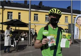  ?? FOTO: VESA MOILANEN/LEHTIKUVA ?? ■
De gröna hoppas på att bli största parti i huvudstade­n