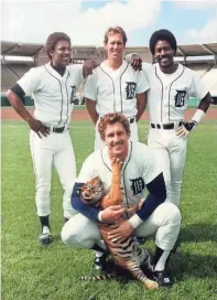  ?? PHOTOS BY MARY SCHROEDER/DETROIT FREE PRESS ?? The Tigers’ Garfield the Tiger, Lance Parrish, Lou Whitaker, Alan Trammell and Chet Lemon during Spring training in Florida in 1984.